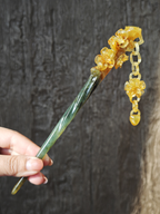 Golden Plum with Dangling Bloom