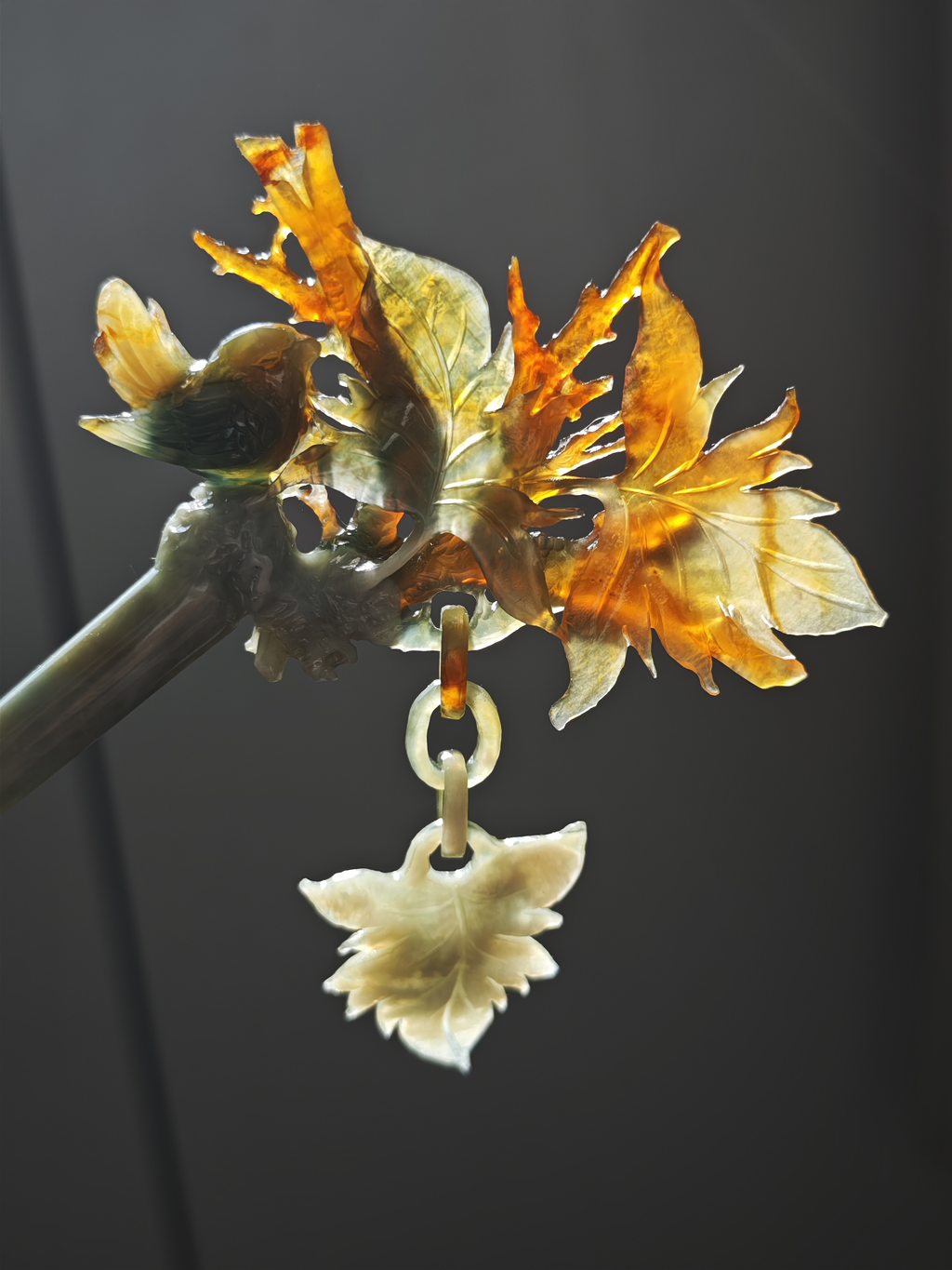 Golden Wutong with Perched Bird